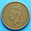 Монета Британской Западной Африки 1 шиллинг 1943 год.