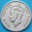 Монета Родезия 1 шиллинг 1952 год.