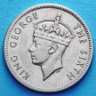 Монета Родезии 1 шиллинг 1948 год.