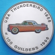 Монета Суринама 100 гульденов 1996 год. Форд 1956.
