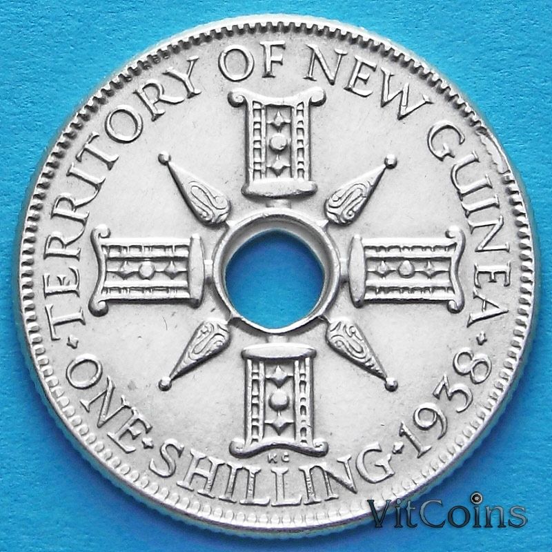 Монета Британской Новой Гвинеи 1 шиллинг 1938 год. Серебро.