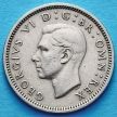 Монета Великобритании 6 пенсов 1951 год.