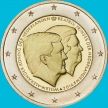 Монета Нидерланды 2 евро 2014 год. Король Виллем-Александр и принцесса Беатрикс