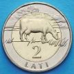 Монета Латвии 2 лата 1999 год. Корова.